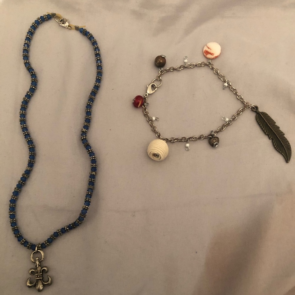 Handmade charm bracelet and fleur de lis necklace